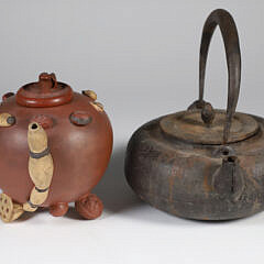 Two Japanese Teapots, a Ceramic and Cast Iron