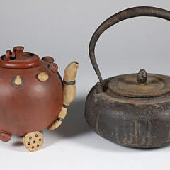 Two Japanese Teapots, a Ceramic and Cast Iron