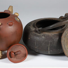Two Japanese Teapots, a Ceramic and Cast Iron