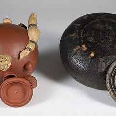 Two Japanese Teapots, a Ceramic and Cast Iron