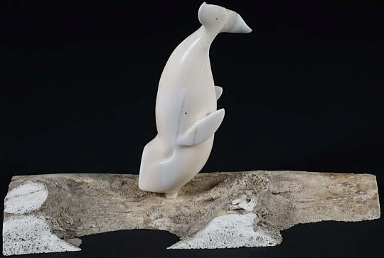 Carved Breaching Whale on Bone