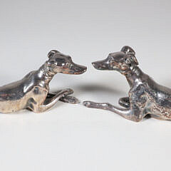 Pair of Steel Seated Whippets