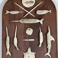 Vintage Folk Art Carved Bone Plaque with 20 Carved Artifacts of Sea Life and Tools