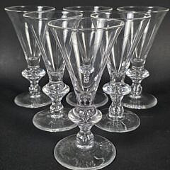Set of Six Signed Steuben Clear Glass Trumpet Form Champagne Glasses