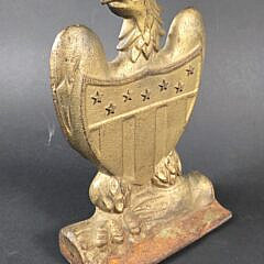 Antique Gilt Painted Cast Iron Eagle and Federal Shield Doorstop, circa 1920s