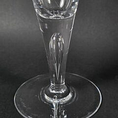 Set of Eight Signed Steuben Clear Glass Trumpet Form Champagne Glasses, 20th century