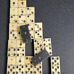 Complete Set of Antique Sailor Made Bone and Ebony Dominoes, 19th century