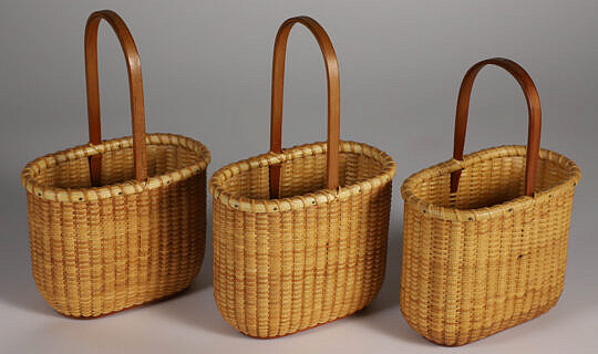 Three Oval Nantucket Lightship Baskets with Wooden Handles