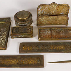 Tiffany Studio New York "Pine Needle" Pattern Gilt Bronze and Favrile Slag Glass Desk Set Collection