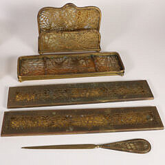 Tiffany Studio New York “Pine Needle” Pattern Gilt Bronze and Favrile Slag Glass Desk Set Collection