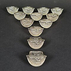 Group of Twelve Silver Plated Nantucket Friendship Basket Purse Napkin Rings