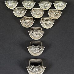 Group of Twelve Silver Plated Nantucket Friendship Basket Purse Napkin Rings